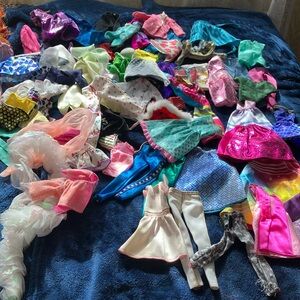 Huge lot of Barbie clothes